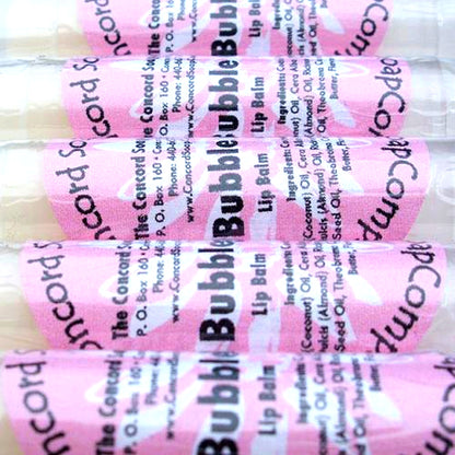 Handmade Bubble Gum lip balm tubes with pink labels displayed in a row on a white background.