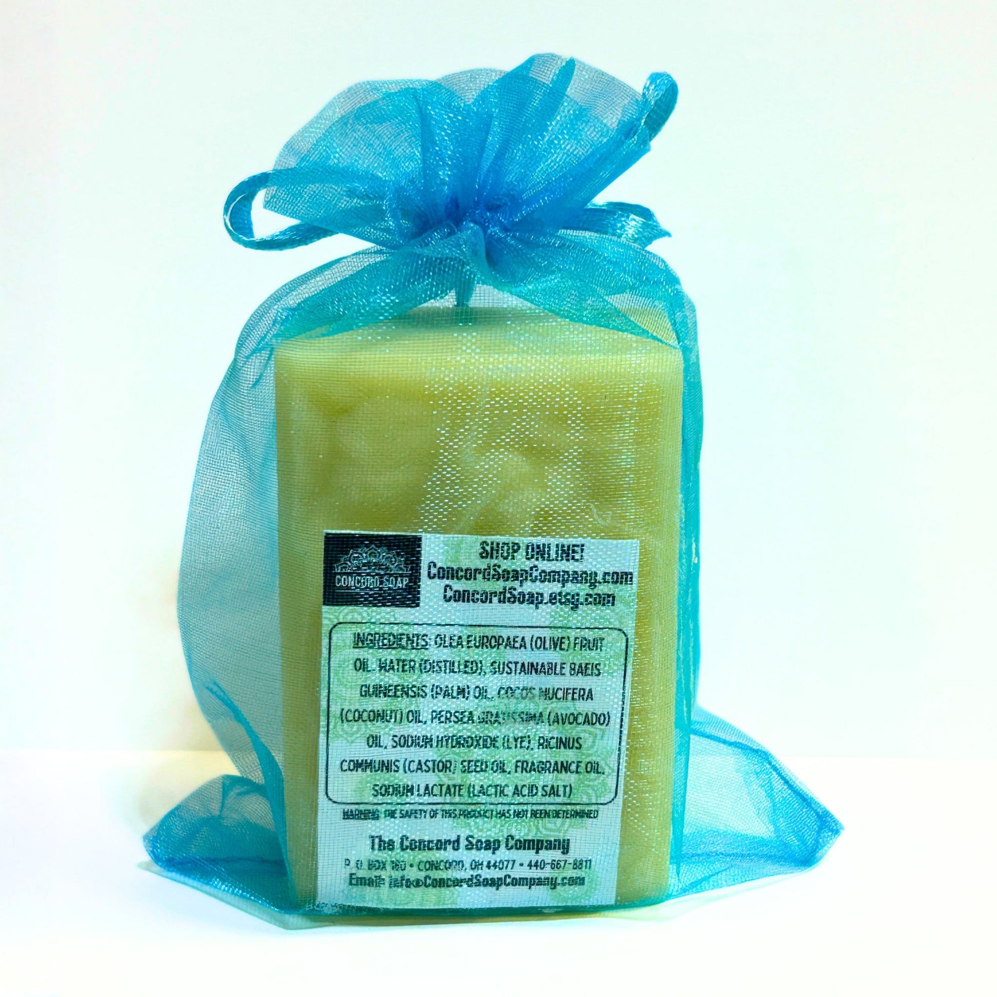 Back of Vacay Vibes handmade soap bar showing Concord Soap Company ingredients label and website, natural vegan cold process soap.