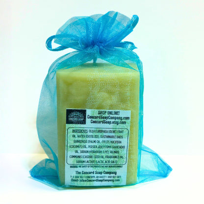 Back of Vacay Vibes handmade soap bar showing Concord Soap Company ingredients label and website, natural vegan cold process soap.