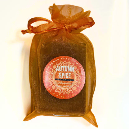 Autumn Spice soap wrapped in orange organza bag with front label.