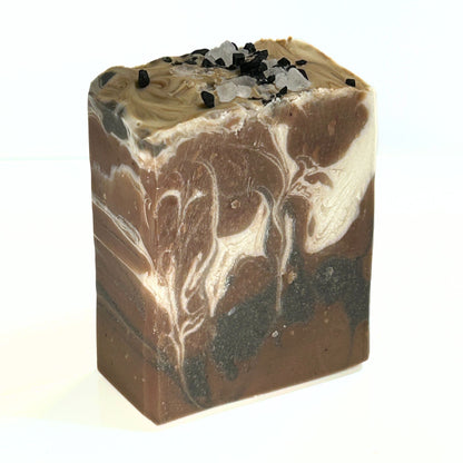 Single Grandpa’s Pipe soap bar standing upright, highlighting the marbled swirl design and salt topping.
