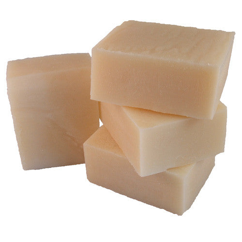 stack of four handmade soap bars