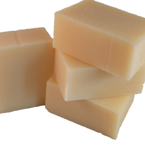 stack of four handmade soap bars